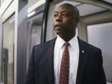In this May 27, 2021, file photo Sen. Tim Scott, R-S.C., arrives as senators go to the chamber for votes ahead of the approaching Memorial Day recess, at the Capitol in Washington. Mr. Scott is involved in bipartisan negotiations on a police-reform package. (AP Photo/J. Scott Applewhite, File) **FILE**