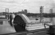 Showing form work for Pier #5. Falsework was built from timber as the mold for pouring concrete. The first upstream rib was poured on July 8, 1915.