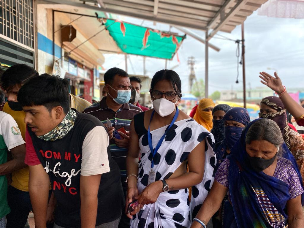 Indore-based transgender activist Sandhya Gharvi stands among other Indore residents at a vaccination camp | Nirmal Poddar | ThePrint