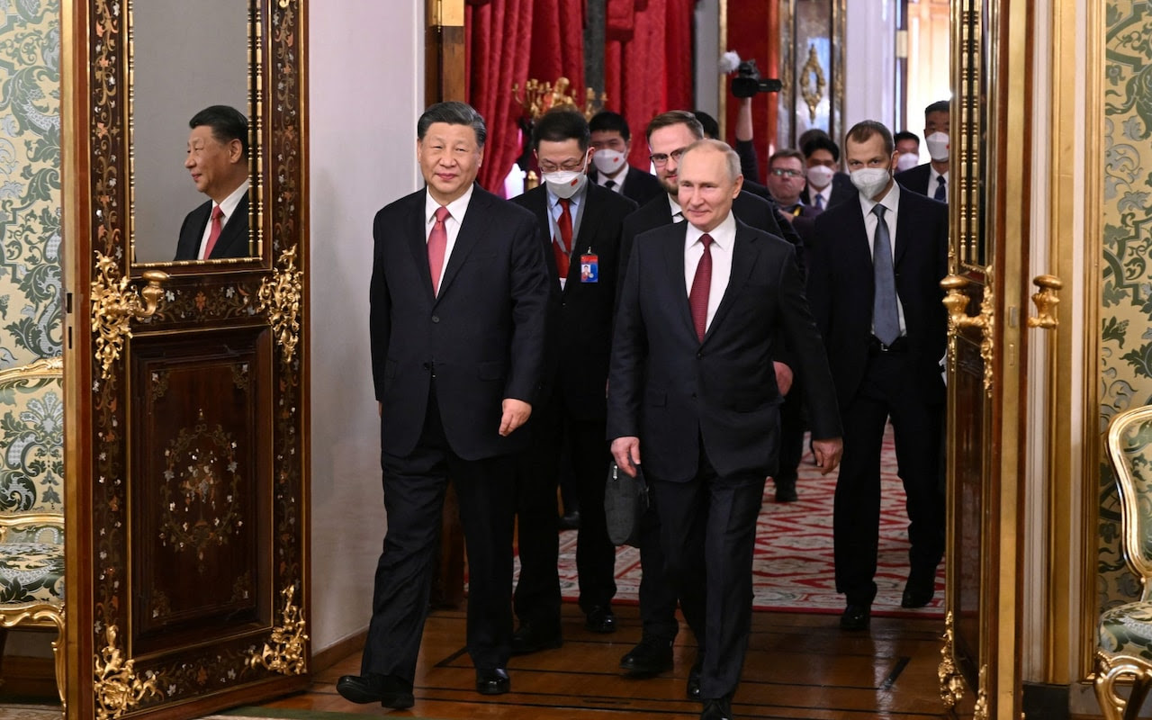 Russian President Vladimir Putin and Chinese President Xi Jinping at the Kremlin in Moscow