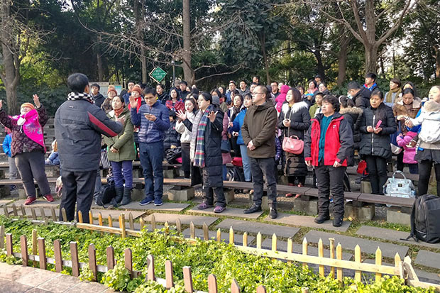 People praying outside