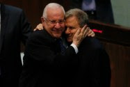 President-elect Reuven Rivlin embraces challenger MK Meir Sheetrit prior to second round of voting