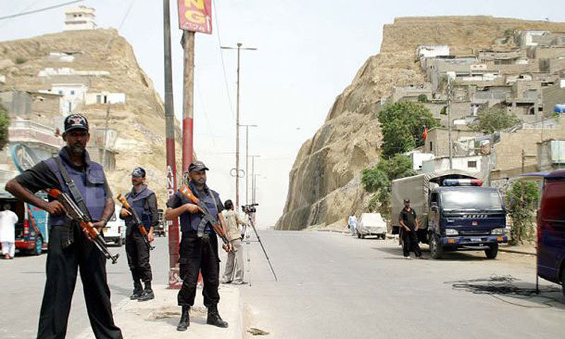  Police commandos petrol Karachis violent Kati Pahari (Split Mountain) area. One side of the hill is populated by Mohajirs and the other by Pakhtuns. 