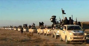 ISIS soldiers in convoy in confiscated trucks in Iraq. Photo: Twitter / nayelshafei.