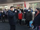 In this photo released by Xinhua News Agency, Chinese President Xi Jinping wearing a protective face mask speaks to residents as he inspects the novel coronavirus pneumonia prevention and control work at a neighbourhoods in Beijing, Monday, Feb. 10, 2020. China reported a rise in new virus cases on Monday, possibly denting optimism that its disease control measures like isolating major cities might be working, while Japan reported dozens of new cases aboard a quarantined cruise ship. (Pang Xinglei/Xinhua via AP)