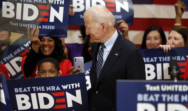 Democratic presidential candidate former Vice President Joe Biden enters a campaign event in Columbus, Ohio, Tuesday, March 10, 2020. (AP Photo/Paul Vernon)