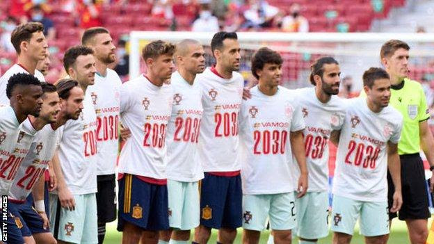 Spain and Portugal players wore 'Vamos 2030' T-shirts before Friday's friendly in Madrid