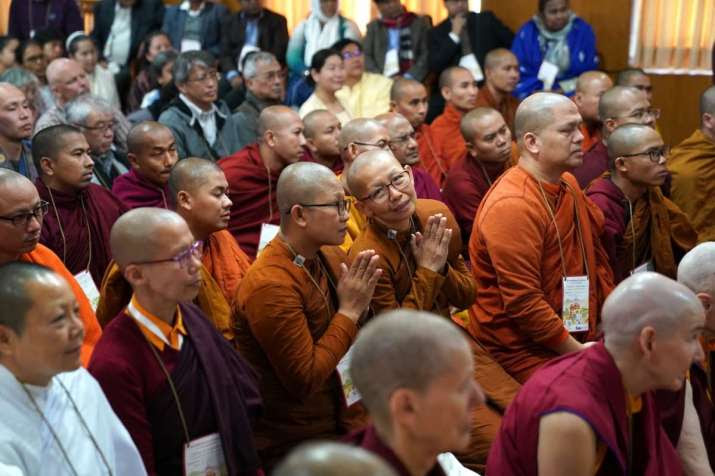 INEB members listen to the Dalai Lama speak in Dharamsala. Images courtesy of INEB