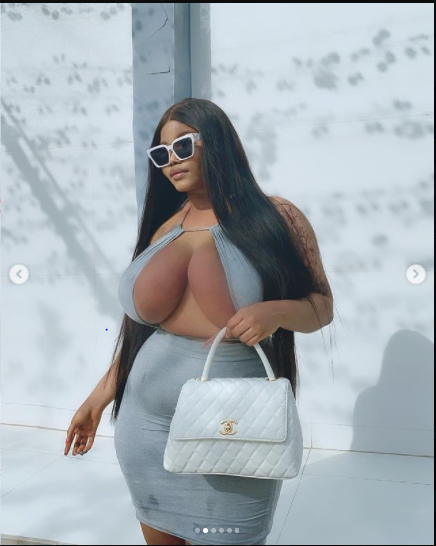 Endowed Instagram star, Ada La Pinky commands attention as she flaunts her massive boobs in revealing dress (photos)
