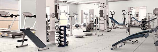 fitness center full of equipment