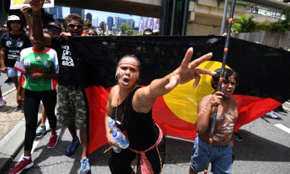 Indigenous protesters march through central Brisbane to protest what they call “Invasion Day” on Australia Day in Brisbane, Thursday, Jan. 26, 2017.