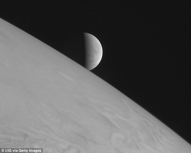 New Horizons took this image of the icy moon Europa rising above Jupiter's cloud tops. The space agency is planning a mission to Europa, which may launch as early as 2022, to find out whether the moon is habitable