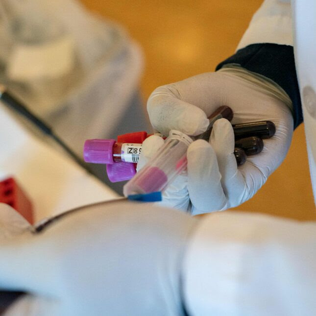 blood samples in hand