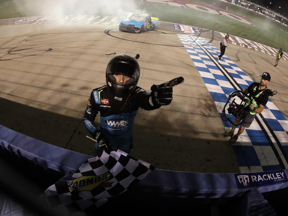 ATLANTA, GA - JULY 09: Austin Dillon (#3 Richard Childress Racing Dow  Salutes Veterans Chevrolet) pulls ahead of Noah Gragson (#42 LEGACY MOTOR  CLUB Sunseeker Resort Chevrolet) during the NASCAR Cup Series