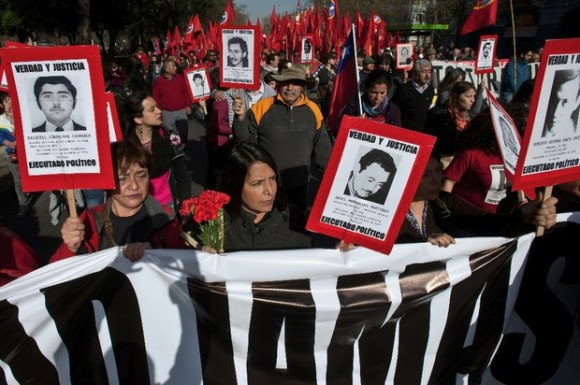 Marcha en Santiago este domingo para conmemorar el 41 aniversario del Golpe de Estado. Foto Xinhua