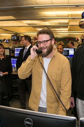  Seth Rogen answers the phones on the trading floor at ICAP's North American headquarters in Jersey City, NJ