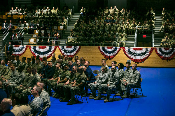 Military members listening to President Trump's address on Afghanistan at Fort Myer in Arlington, Va., on Monday.