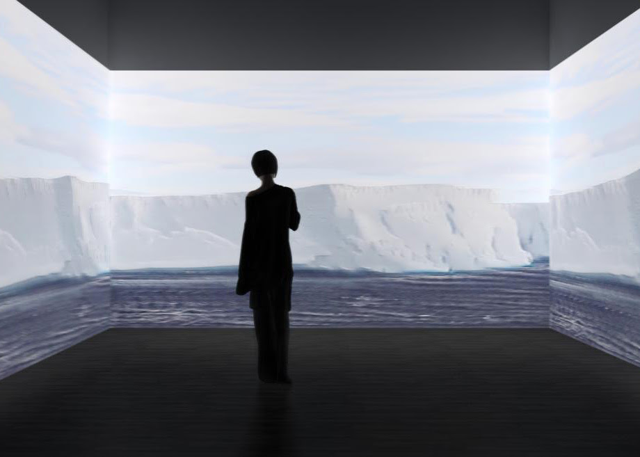 A silhouette of a person stands in front of an antarctic landscape projected on to a white cube space.