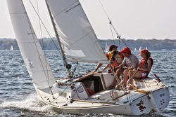 J/22 one-design sailboat- sailing upwind on a lake