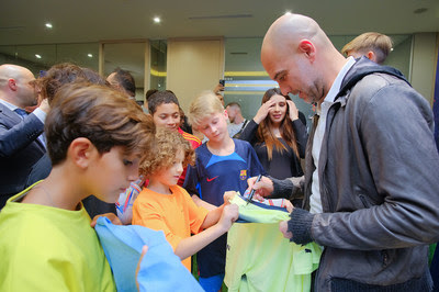 Pep Guardiola with Kids at the CFI Offices
