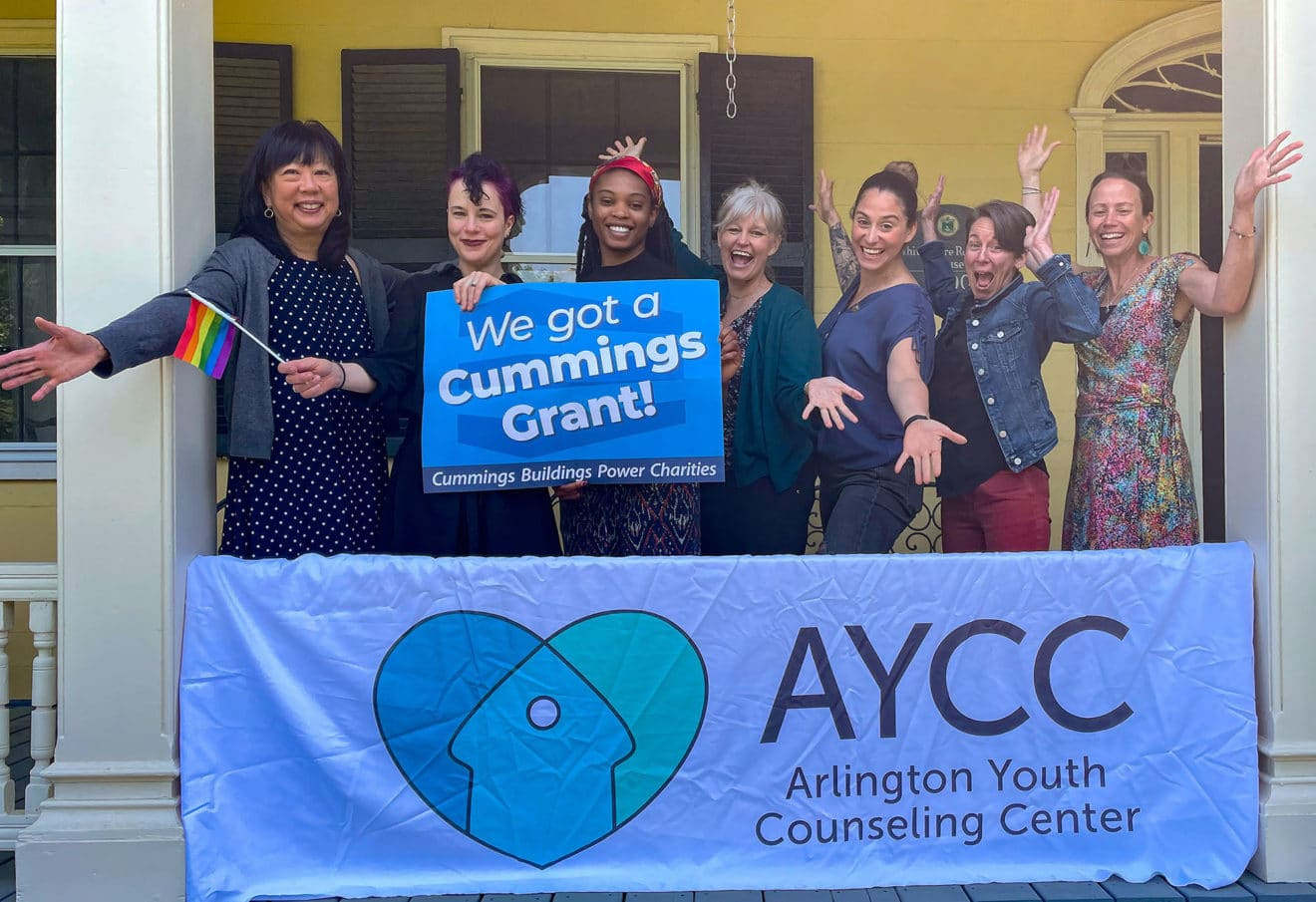 Staff members at the Arlington Youth Counseling Center celebrate earning a $500,000, 10-year grant from the Cummings Foundation that will help support their ongoing work for the next 10 years. (Photo Courtesy Arlington Youth Counseling Center)