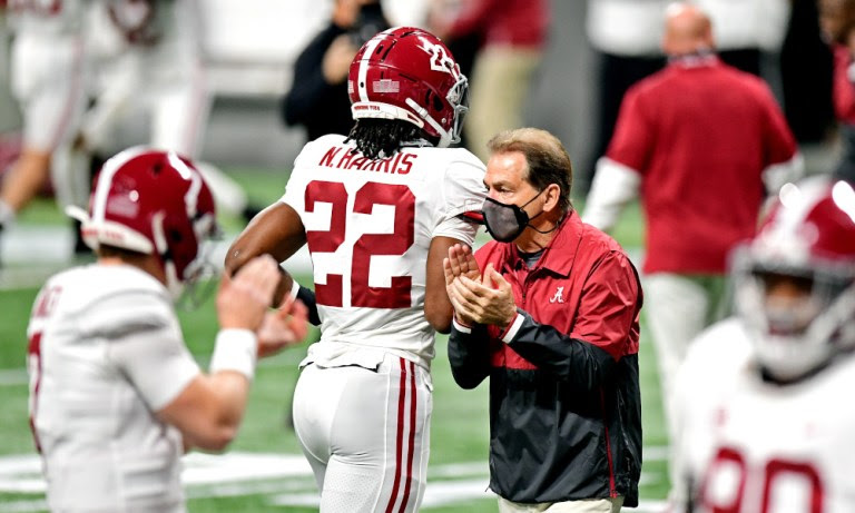 Nick Saban clapping during pregame for SEC Championship