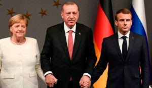Erdogan to hold migration summit with Merkel and Macron, but not Greece’s Mitsotakis