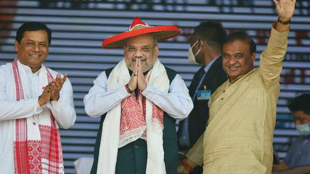 
Union Home Minister Amit Shah flanked by Assam Chief Minister Sarbananda Sonowal and Assam Finance Minister Himanta Biswa Sarma, during a rally in Nagaon district of Assam. File photo
