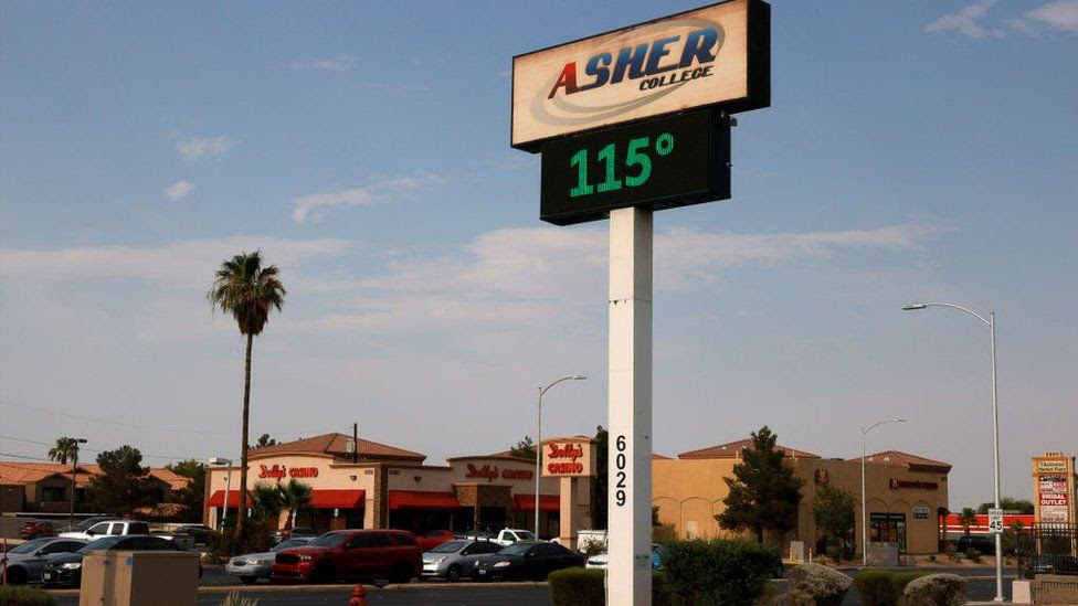A digital sign displays a temperature of 115 degrees Fahrenheit in Las Vegas