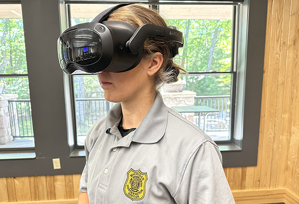 conservation officer wearing virtual reality headset