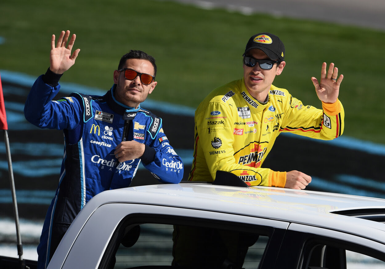 NASCAR drivers Kyle Larson (L) and Joey Logano in 2020