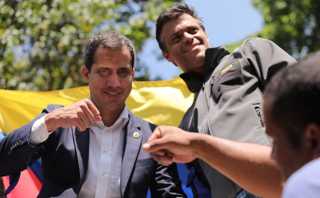 Venezuelan opposition leaders Guaido and Lopez address supporters in Caracas