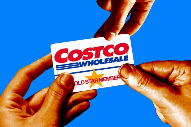 Three hands holding a Costco card