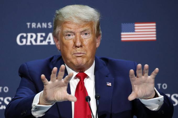 President Trump speaks during a roundtable discussion in Dallas on Thursday. (Alex Brandon/AP)