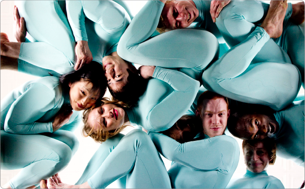 Pilobolus dancers in light blue jumpsuits create human sculpture in OK Go's video "All is Not Lost" (photo credit Nadirah Zakariya)