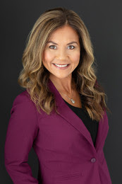 Head shot of a women in business suite