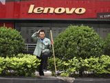 A cleaner works near an empty store of Chinese computer manufacturer Lenovo at a district selling computer products in Beijing, China on Wednesday, May 15, 2019. China&#39;s factory output and consumer spending weakened in April as a tariff war with Washington intensified, adding to pressure on Beijing to shore up shaky economic growth.(AP Photo/Ng Han Guan)