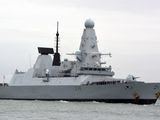 This March 20, 2020, photo shows HMS Defender in Portsmouth, England. The Russian military says its warship has fired warning shots and a warplane dropped bombs to force the British destroyer from Russia&#39;s waters near Crimea in the Black Sea. The incident on Wednesday June 23, 2021, marks the first time since the Cold War era when Moscow used live ammunition to deter a NATO warship, reflecting soaring Russia-West tensions. (Ben Mitchell/PA via AP) **FILE**