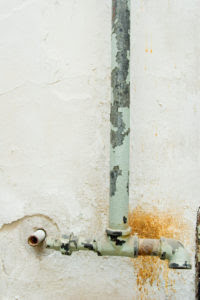 lead pipe with water damage