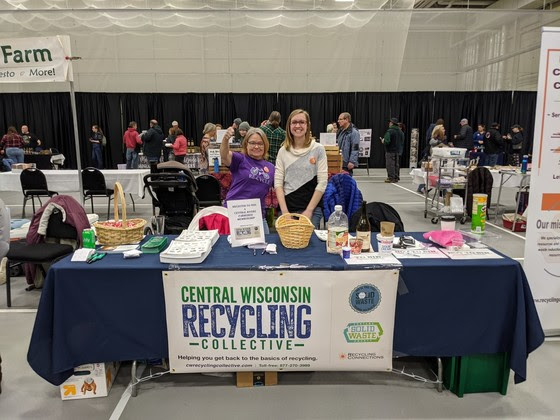 Image of Central Wisconsin Recycling Collective's (CWRC) booth setup at the Local Food Fair.