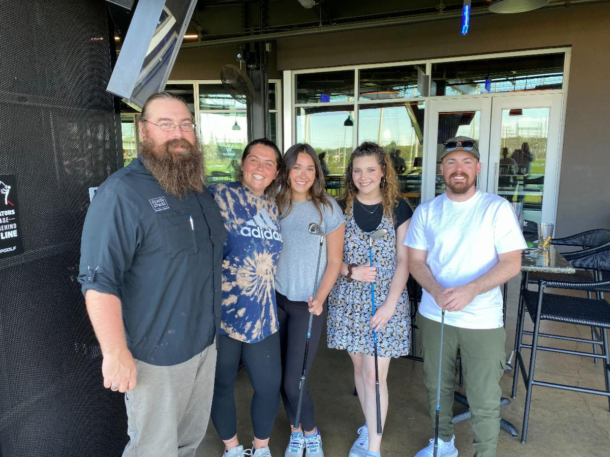 Our Comms Team enjoying at day at Topgolf