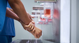 photo of surgeon washing hands