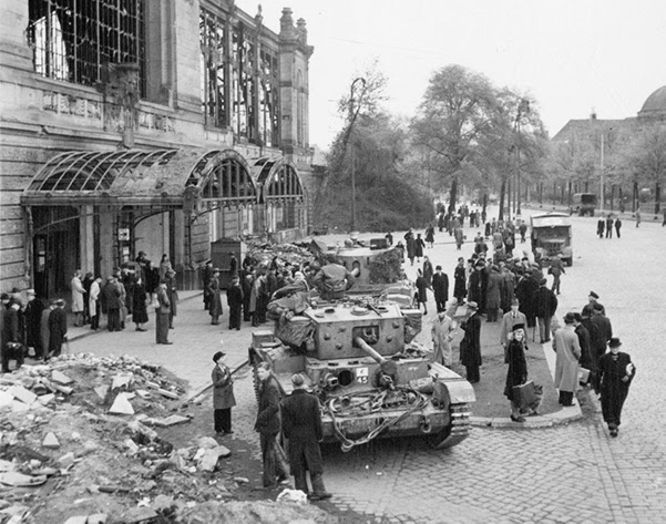 Photograph of armoured vehicles and rubble in postwar Germany