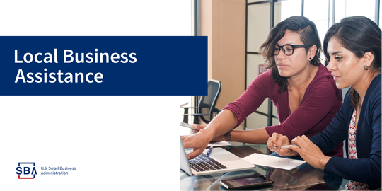 Photo of two people at a desk in front of a laptop with the following text, local business assistance. The SBA logo is at the bottom.