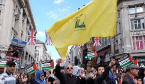 UK: Hizballah flags again fly in London for Al-Quds Day march against Israel