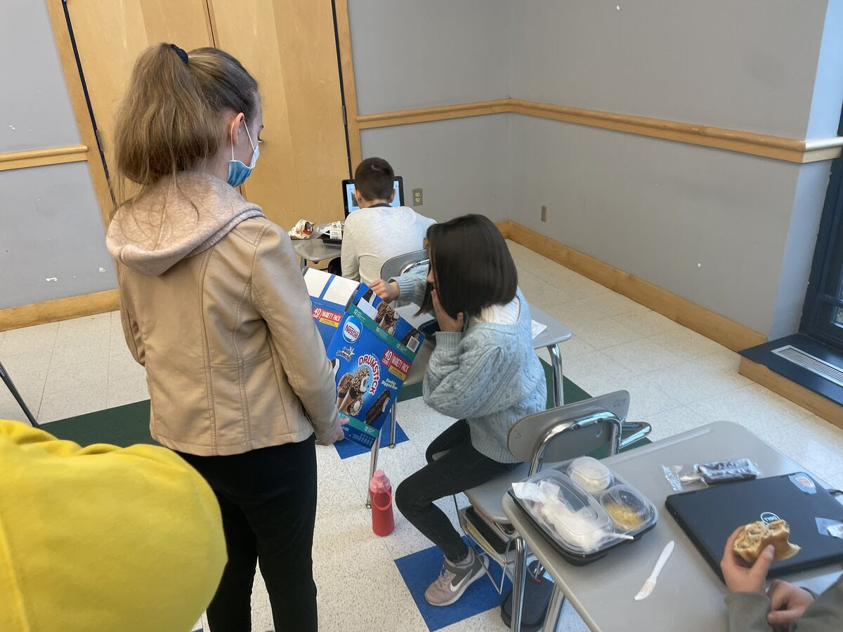 students enjoy ice cream treat