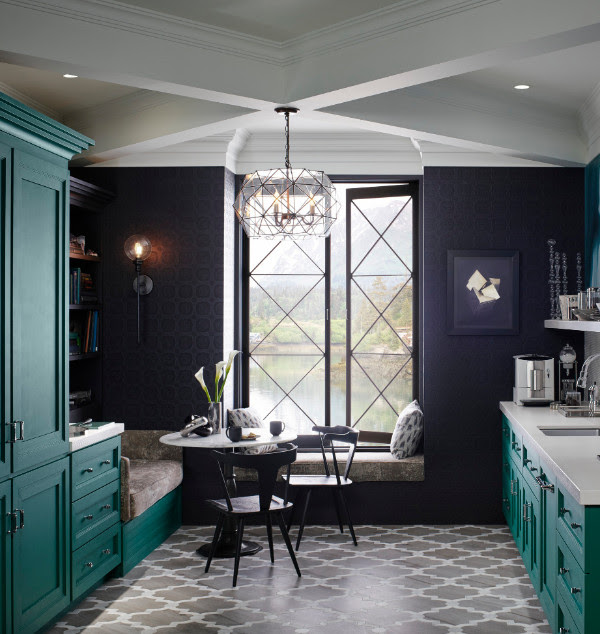 This cal, kitchen is decorated in white and sea green.