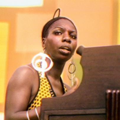 Nina Simone plays the piano