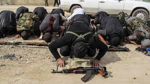 terroristi siriani pregano
