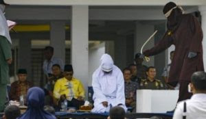 Indonesia: Three couples publicly flogged for un-Islamic public affection